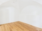 Schlafzimmer - Erstbezug nach Denkmalsanierung – Wunderschöne Wohnung mit Stadtgarten, Terrasse und Kreuzgewölbe